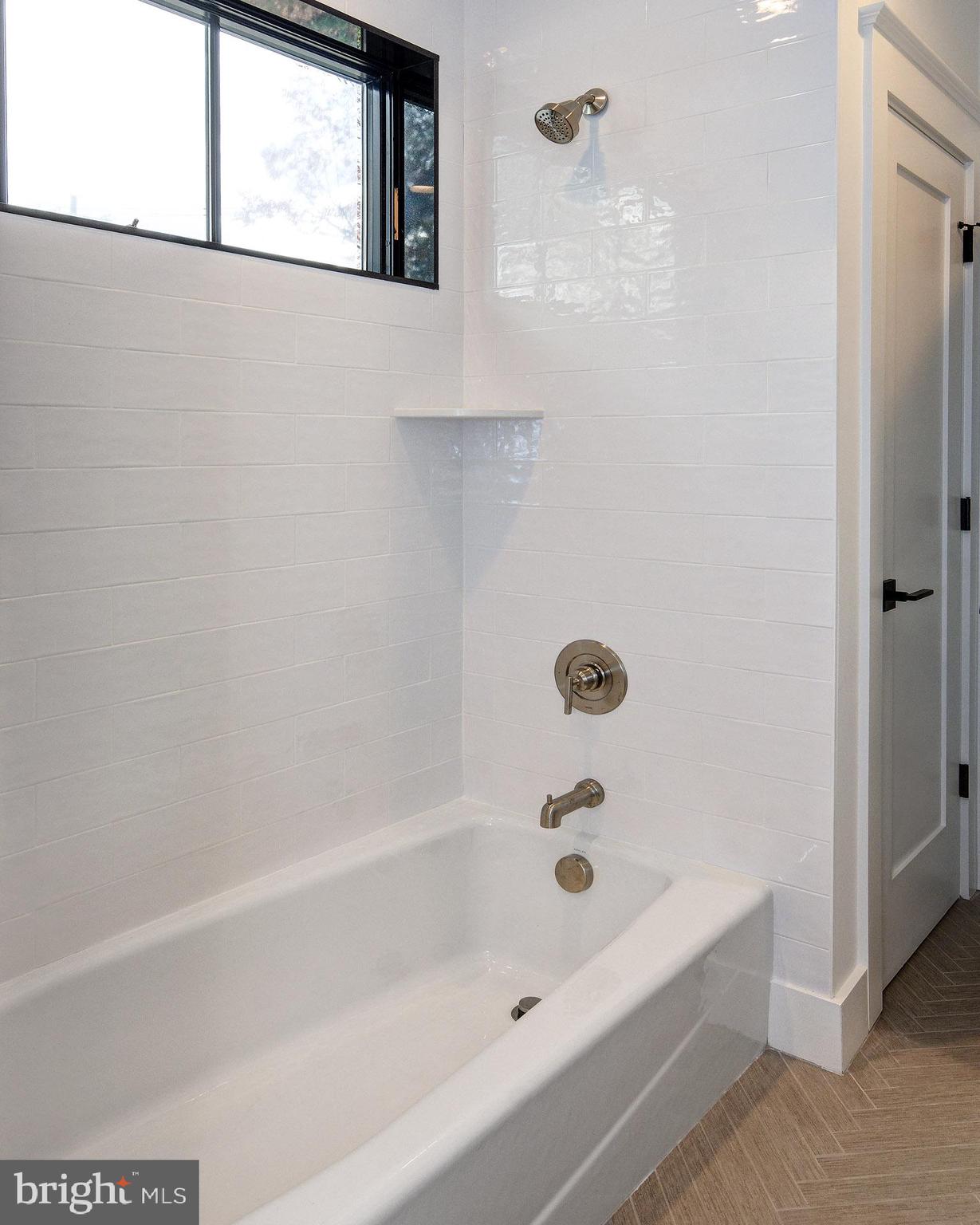 20 East Redman Avenue, Unit D Haddonfield, NJ 08033 - Photo 33 of 43 a bathroom with a bathtub