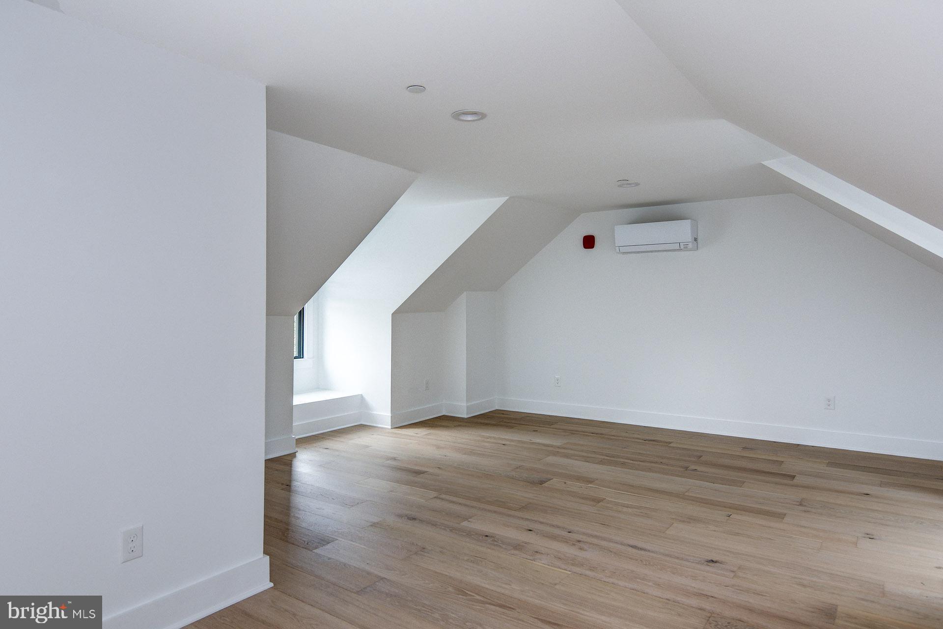 20 East Redman Avenue, Unit D Haddonfield, NJ 08033 - Photo 38 of 43 a view of an empty room with wooden floor
