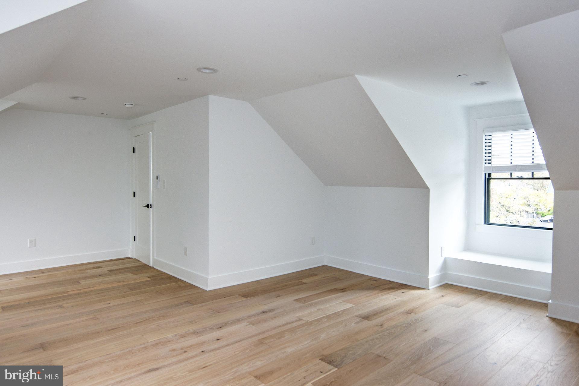 20 East Redman Avenue, Unit D Haddonfield, NJ 08033 - Photo 40 of 43 wooden floor in an empty room with a window