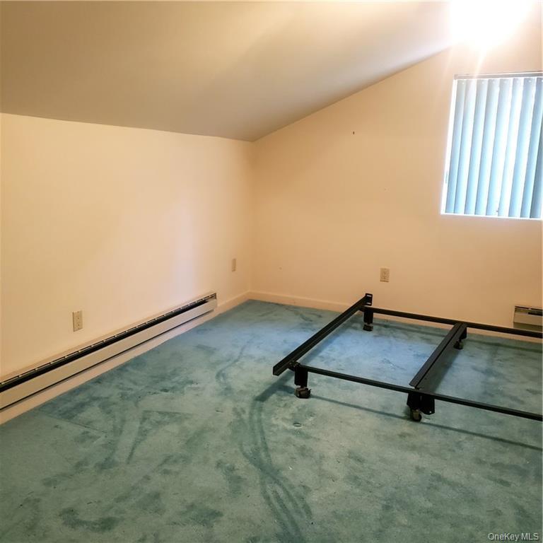 179 Old Turnpike Road Woodridge, NY 12789 - Photo 9 of 14 an empty room with wooden floor