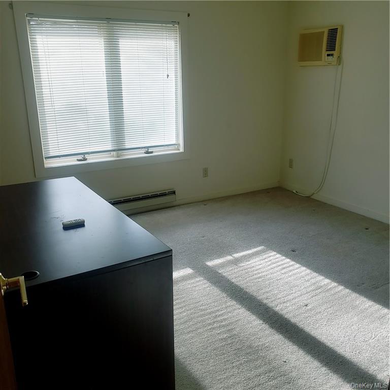 179 Old Turnpike Road Woodridge, NY 12789 - Photo 10 of 14 a view of a kitchen with wooden floor and a window