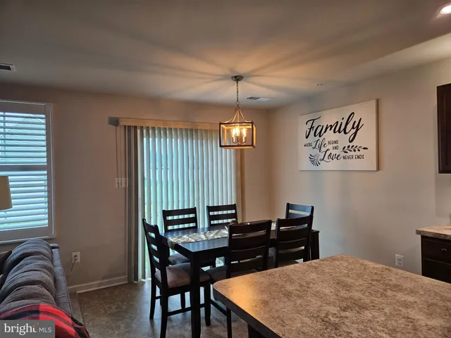 a view of a workspace with furniture