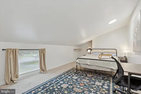 a room with a bed and a table