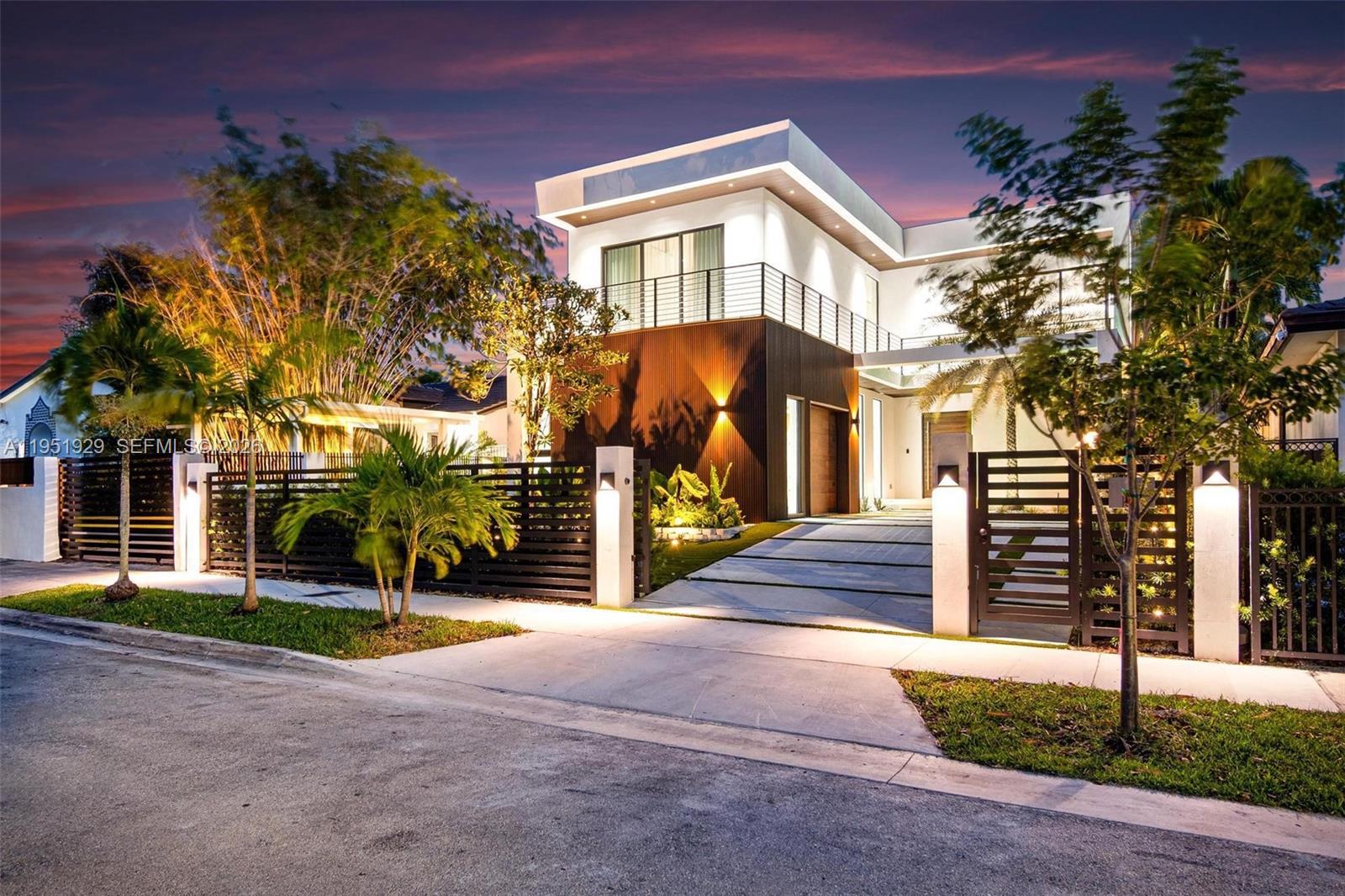 340 Southwest 20th Road Miami, FL 33129 - Photo 36 of 37 a front view of a house with a yard