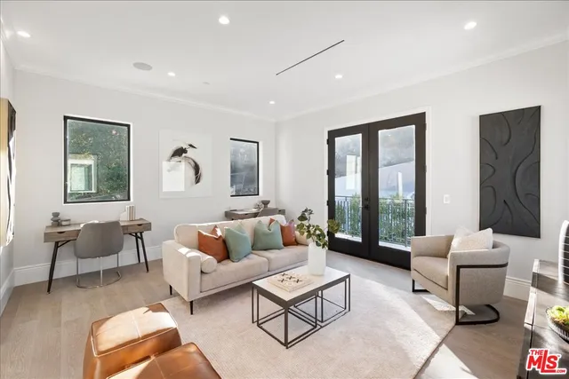 a bathroom with a double vanity sink mirror and shower