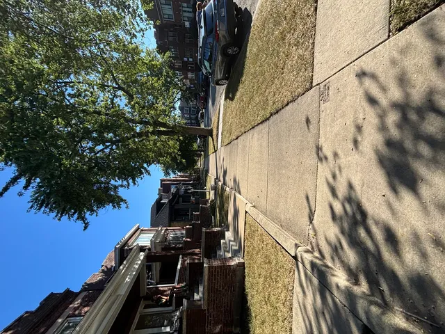 a view of balcony with wooden floor