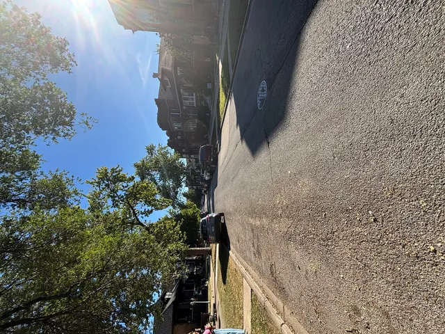 a view of balcony with wooden wall
