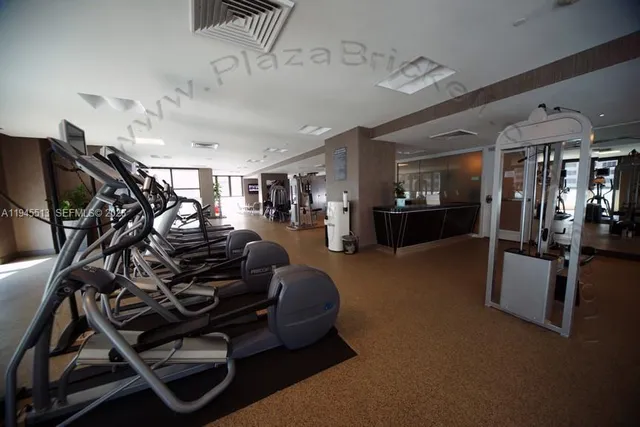 a view of a lobby with furniture and floor to ceiling window