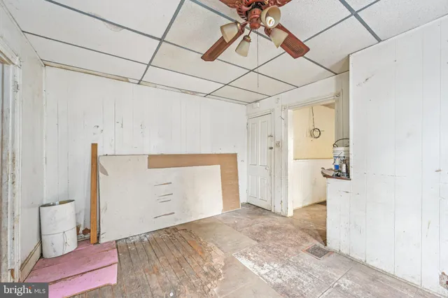 a view of a storage & utility room with a sink