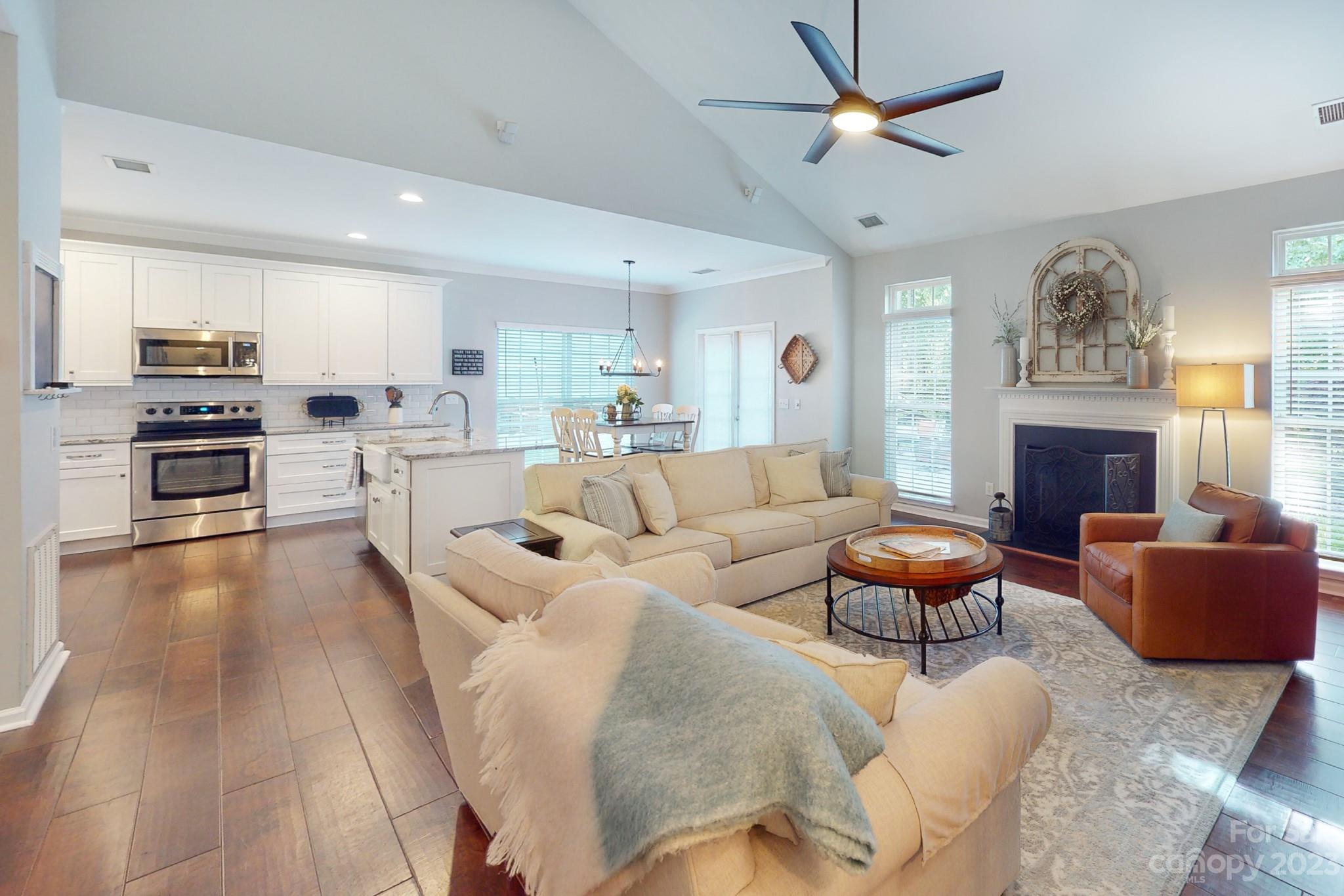 16022 Lavenham Road Huntersville, NC 28078 - Photo 14 of 35 a living room with furniture and a fireplace