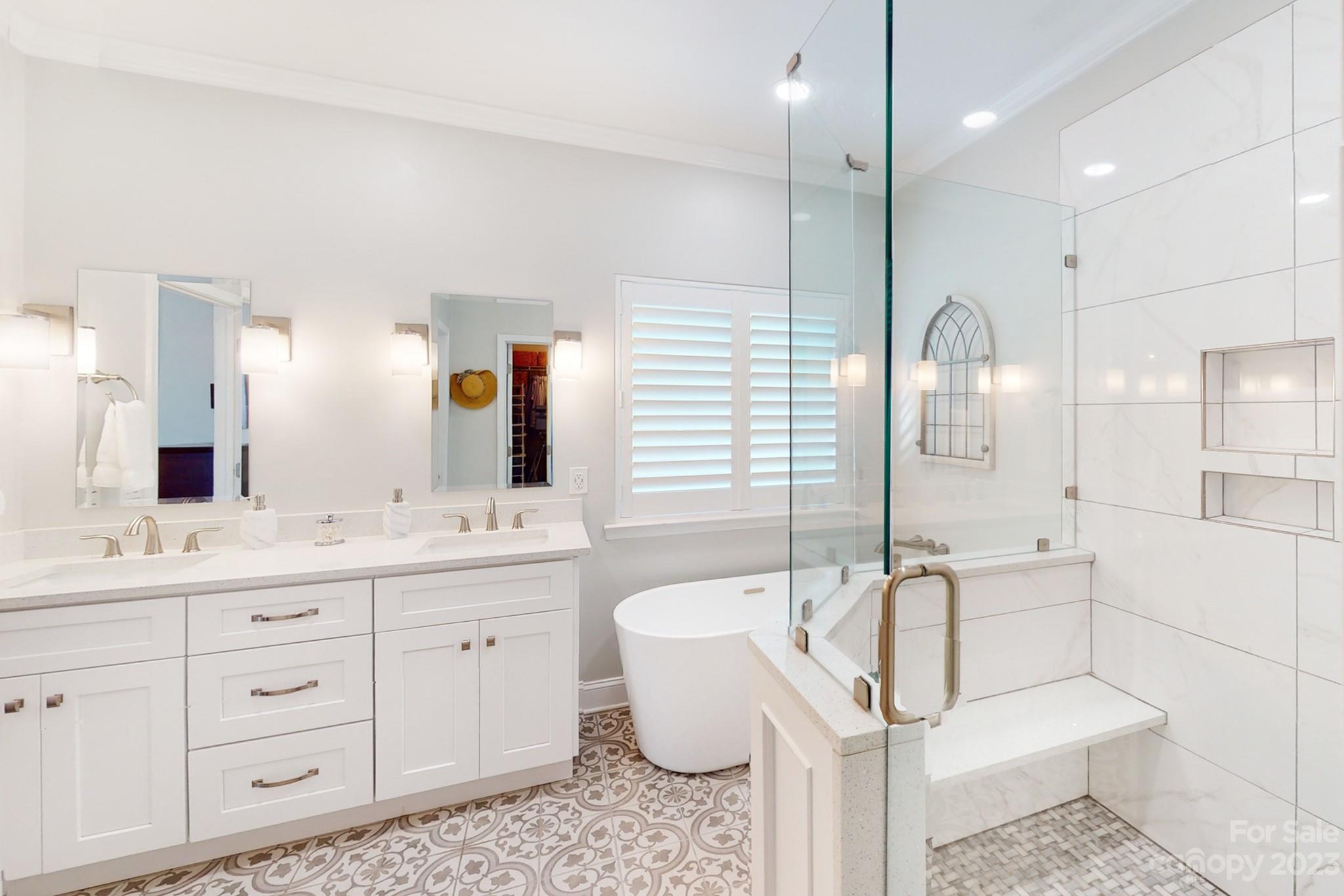 16022 Lavenham Road Huntersville, NC 28078 - Photo 20 of 35 a bathroom with a double vanity sink mirror and toilet