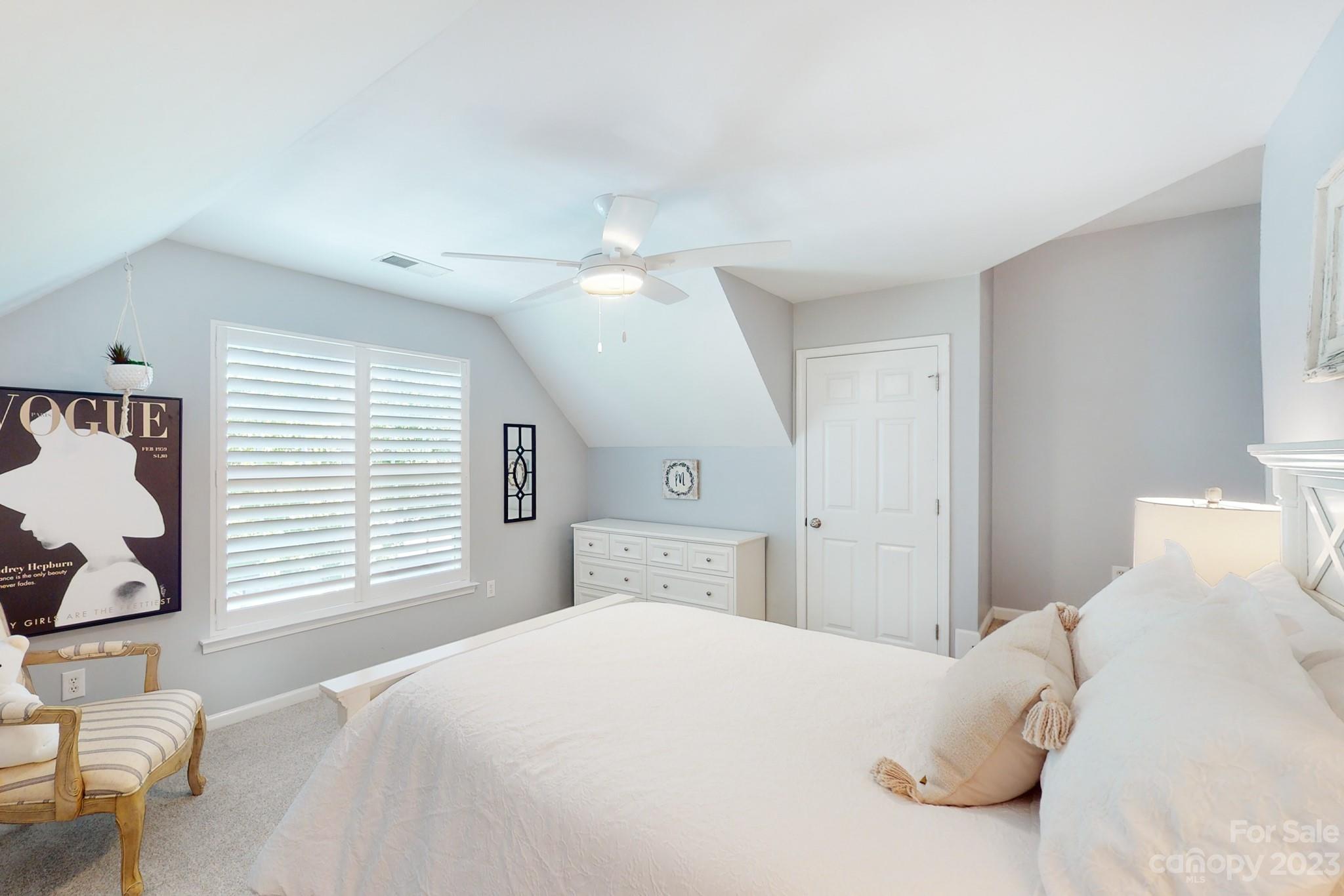 16022 Lavenham Road Huntersville, NC 28078 - Photo 30 of 35 a bedroom with a large bed and a window