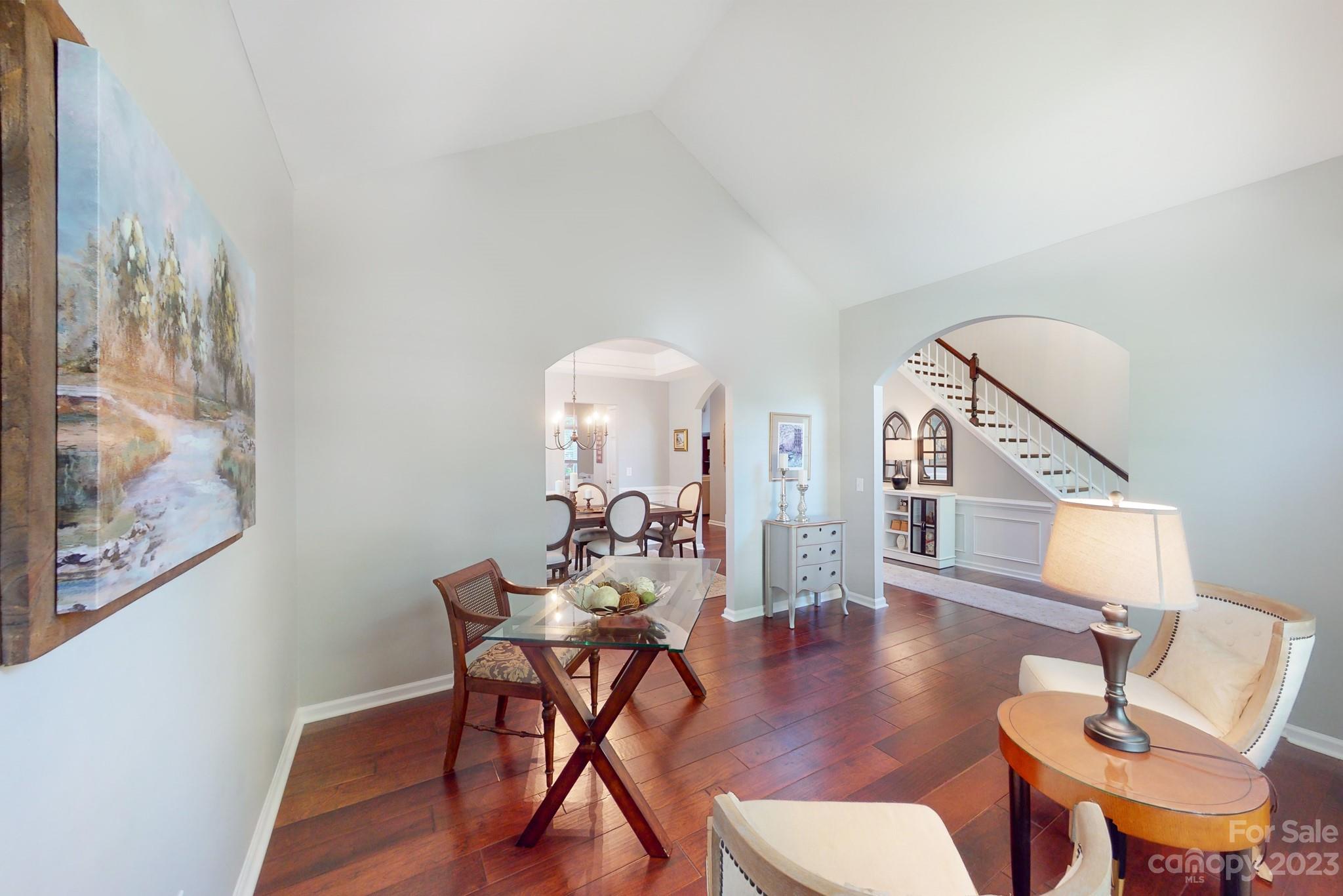 16022 Lavenham Road Huntersville, NC 28078 - Photo 6 of 35 a view of a dining room with furniture and wooden floor