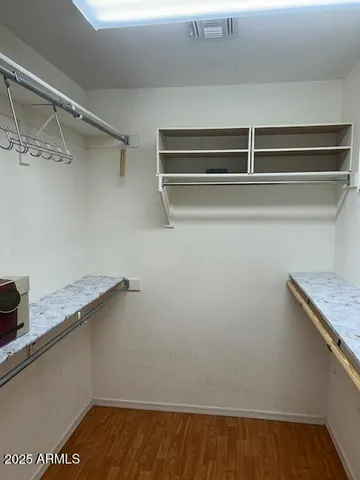a view of a room with rack on the wall