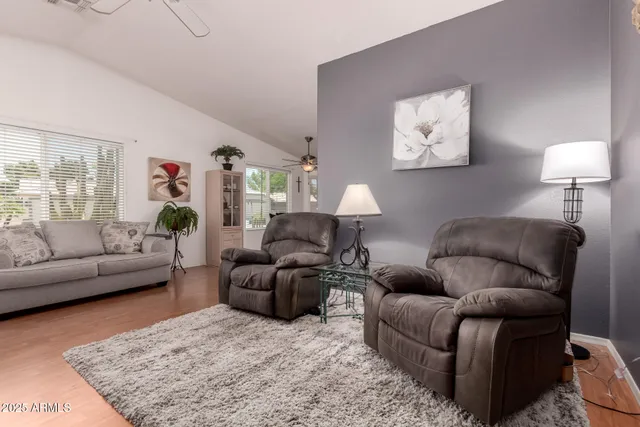 a living room with furniture and a couch