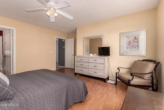 a bedroom with a bed and furniture