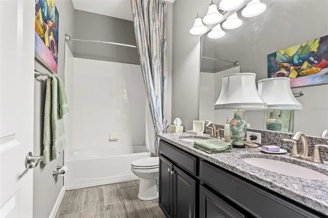 a view of a dining room with furniture and window