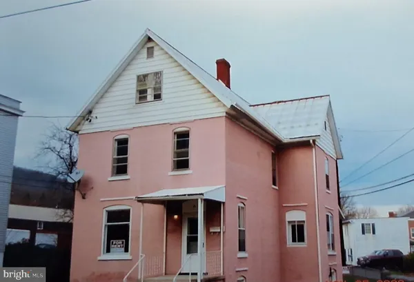 a front view of a house with balcony