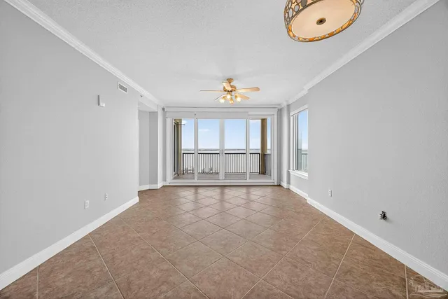 a kitchen with stainless steel appliances granite countertop a stove a sink a refrigerator and a cabinets