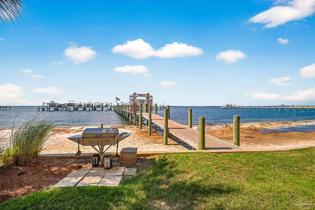 a stove top oven sitting inside of a kitchen