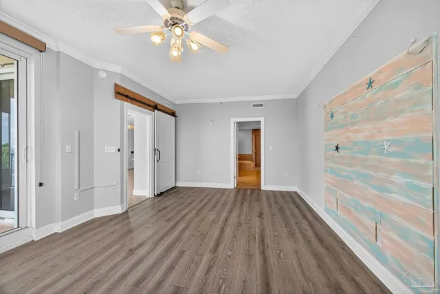 a bathroom with a tub toilet and a shower