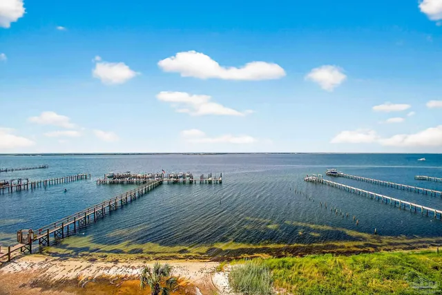 a view of a living room and kitchen
