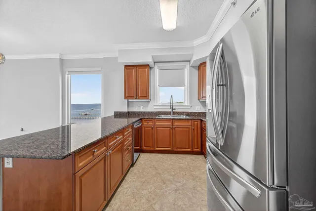 a couple of cars parked in front of a house