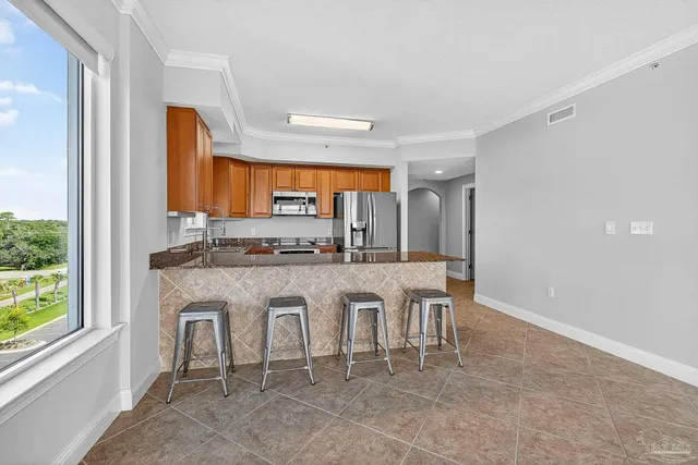 a view of a swimming pool with a lounge chairs