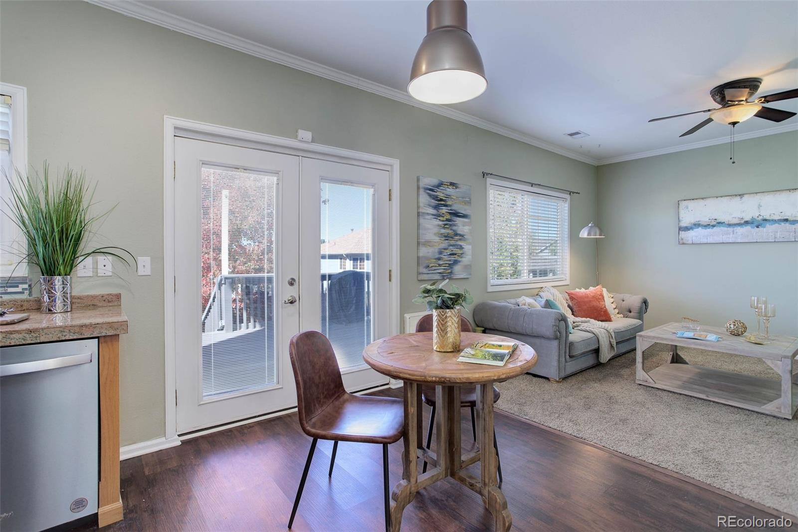 2471 South Andes Circle Aurora, CO 80013 - Photo 12 of 35 a living room with furniture and a potted plant