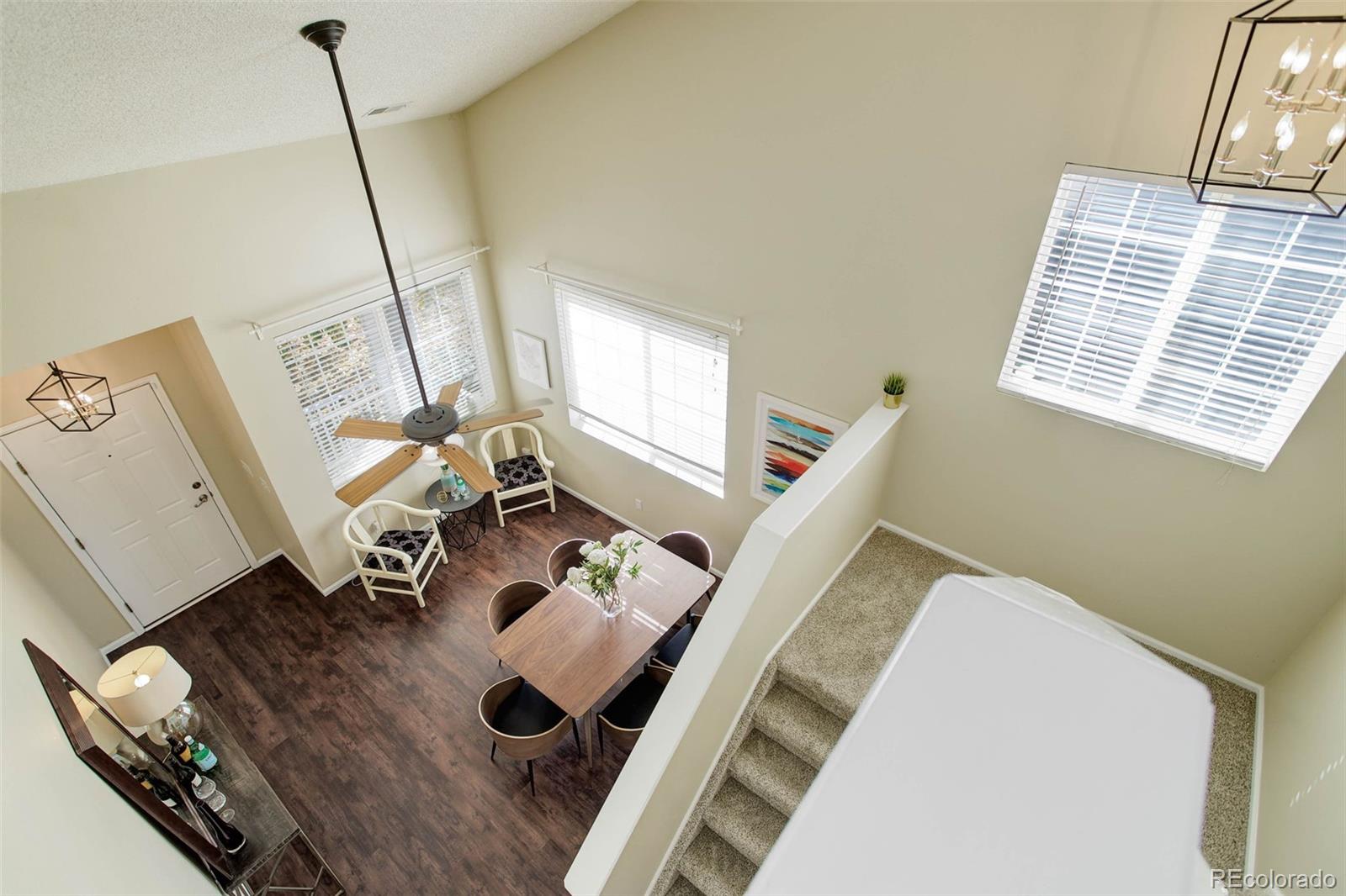 2471 South Andes Circle Aurora, CO 80013 - Photo 17 of 35 a view of living room with furniture and a wooden floor