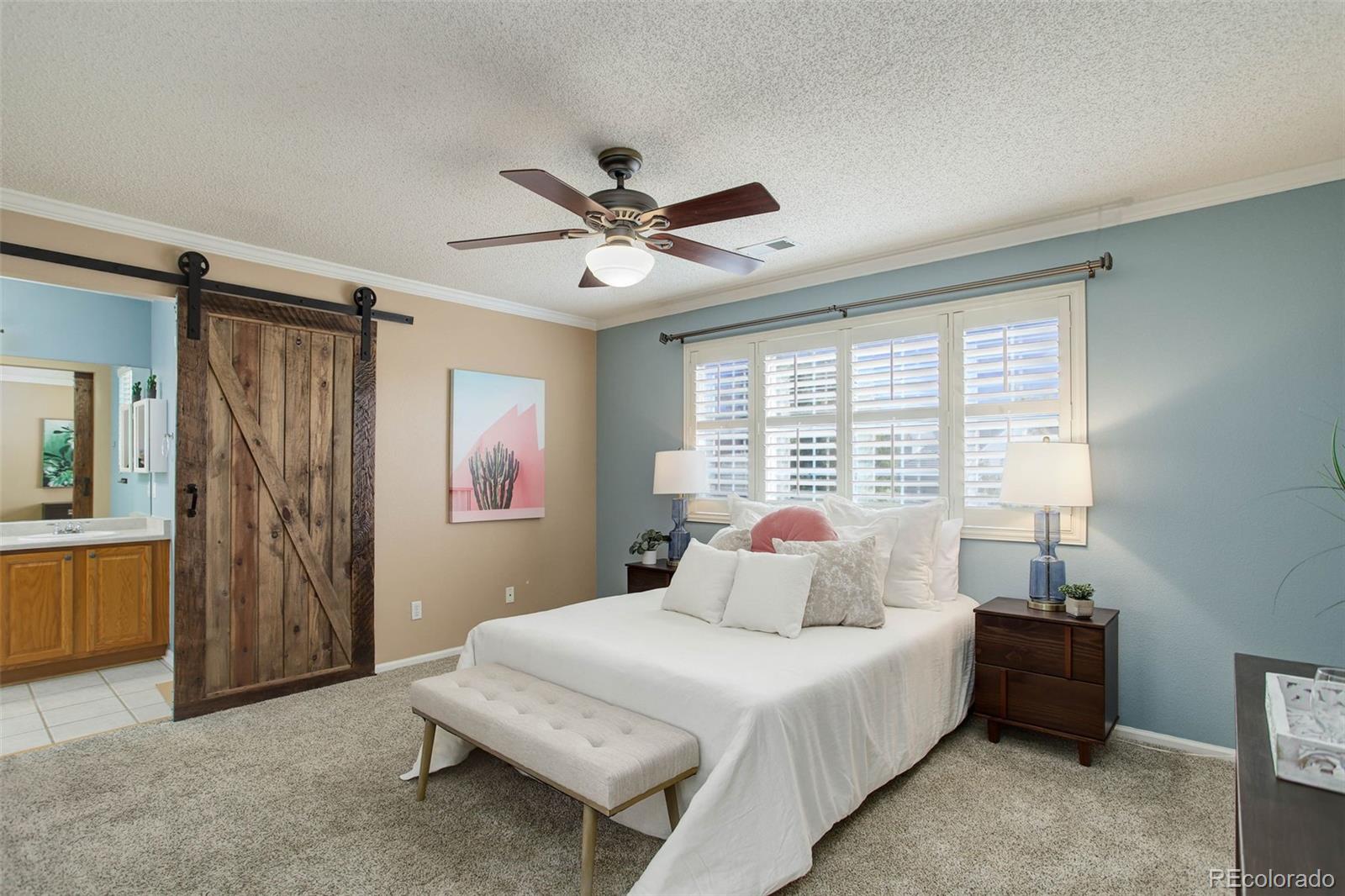 2471 South Andes Circle Aurora, CO 80013 - Photo 18 of 35 a bedroom with a bed and a window