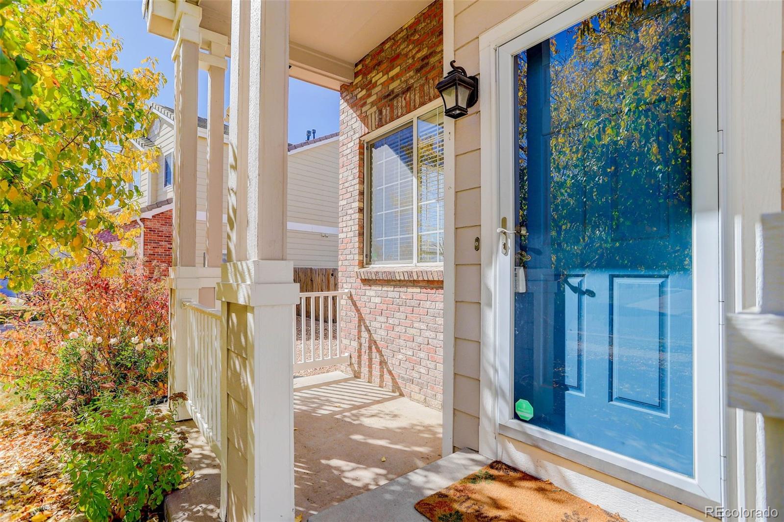 2471 South Andes Circle Aurora, CO 80013 - Photo 2 of 35 a front view of a house with a porch