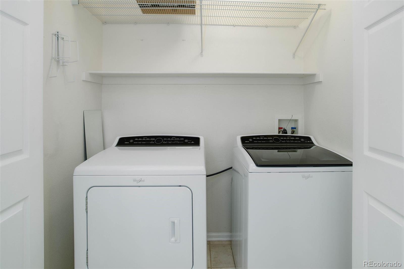 2471 South Andes Circle Aurora, CO 80013 - Photo 26 of 35 a utility room with dryer and washer