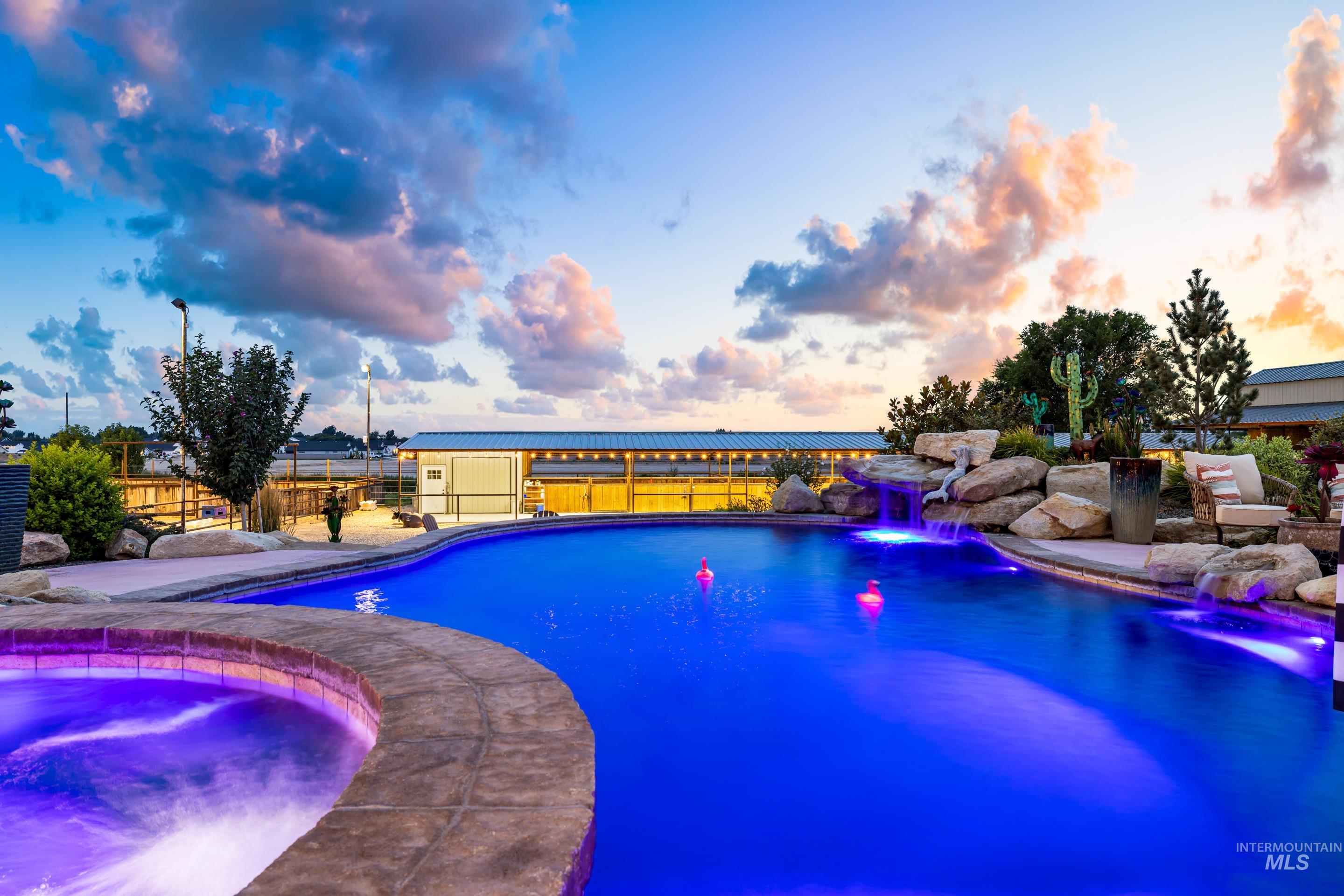9819 Foothill Road Middleton, ID 83644 - Photo 43 of 50 View of pool featuring an in-ground hot tub
