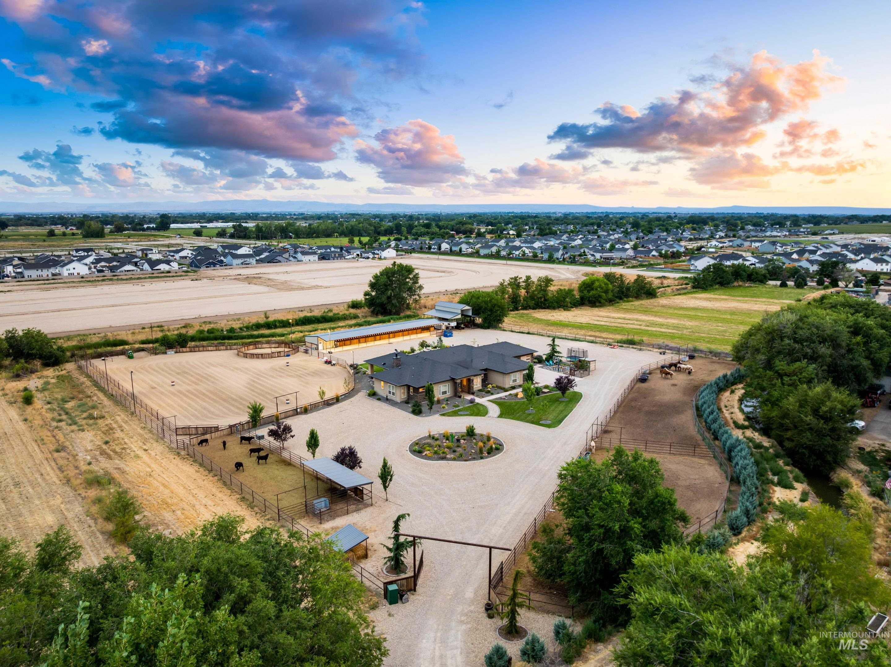 9819 Foothill Road Middleton, ID 83644 - Photo 6 of 50 Aerial view at dusk