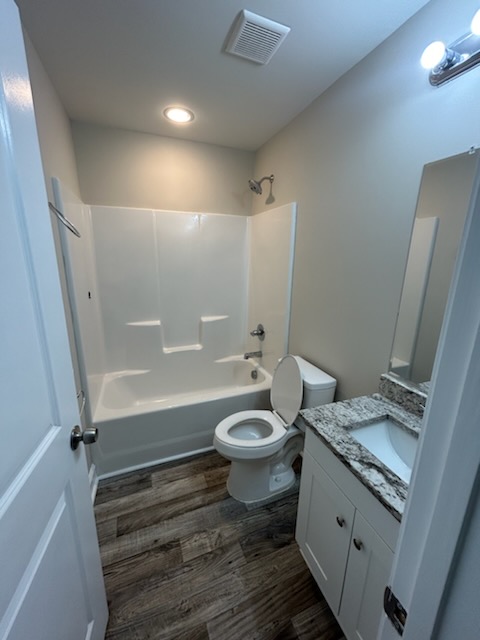 708 Hampton Street Iva, SC 29655 - Photo 14 of 14 This bright bathroom features durable flooring and a functional vanity, perfect for daily routines.