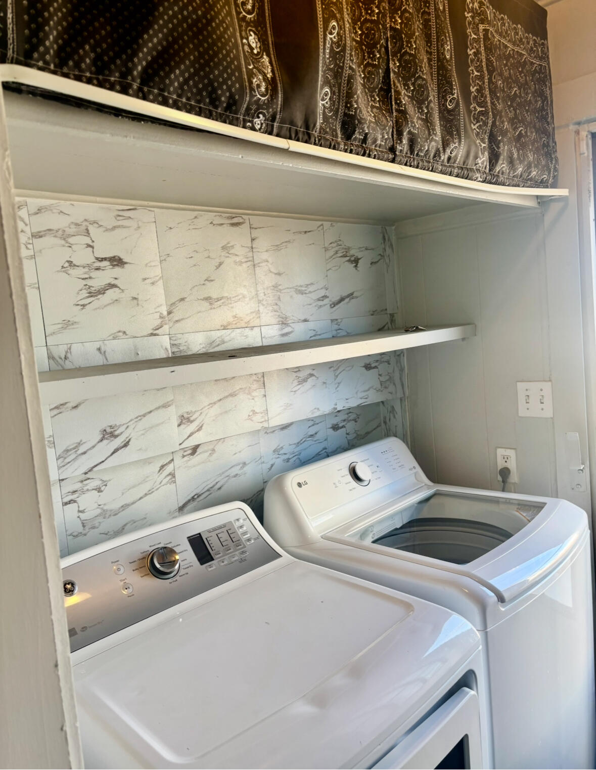 2224 36th Street Lubbock, TX 79412 - Photo 13 of 33 a utility room with dryer and washer