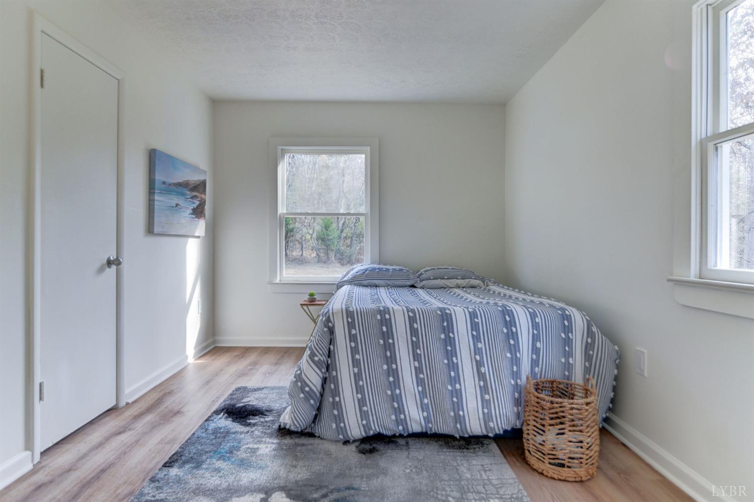 1252 Dearborn Road Evington, VA 24550 - Photo 22 of 31 a bedroom with a bed and a window