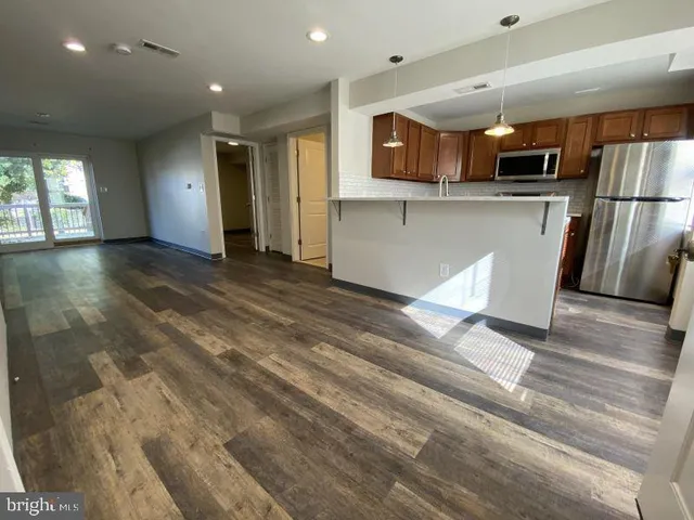a view of a kitchen with a sink