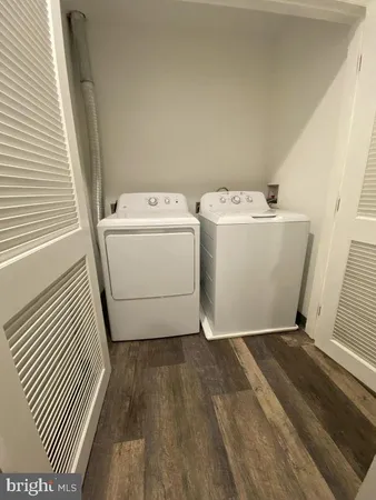 a view of a room with washer and dryer