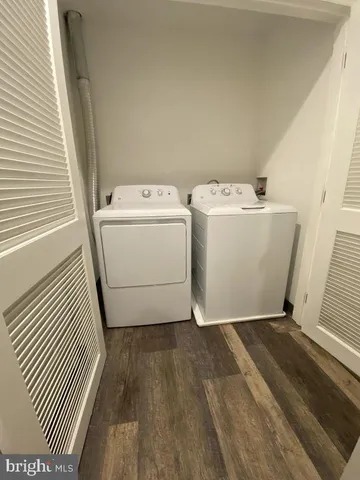 a view of a room with washer and dryer
