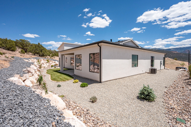 2862 South Mountain Rnch Road Cedar City, UT 84720 - Photo 54 of 64 Modern stucco exterior with black-framed windows