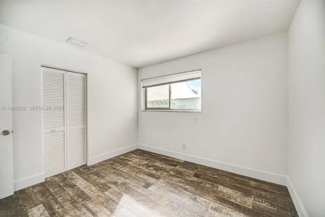 a view of a room with a window