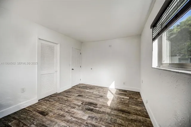 a view of a room with racks on the wall