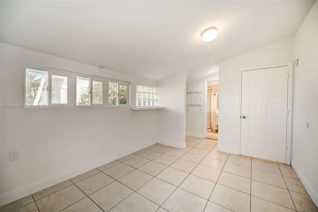 a view of an empty room with window
