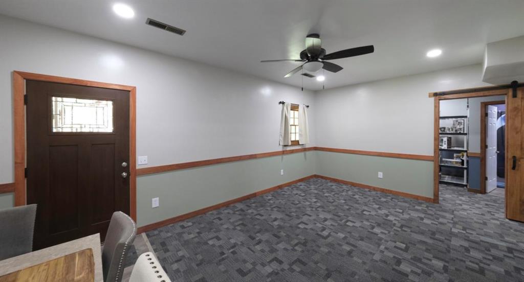 6945 John Rivers Road Fairburn, GA 30213 - Photo 36 of 65 a view of an empty room with a window