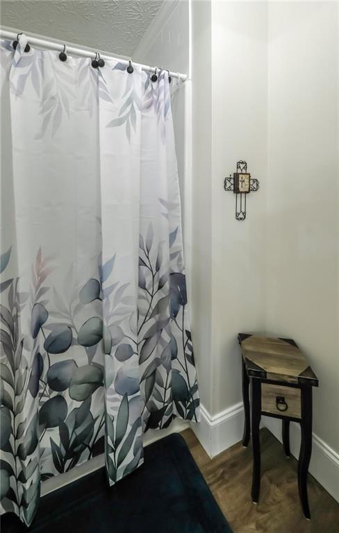 6945 John Rivers Road Fairburn, GA 30213 - Photo 62 of 65 a bathroom with a sink and a shower