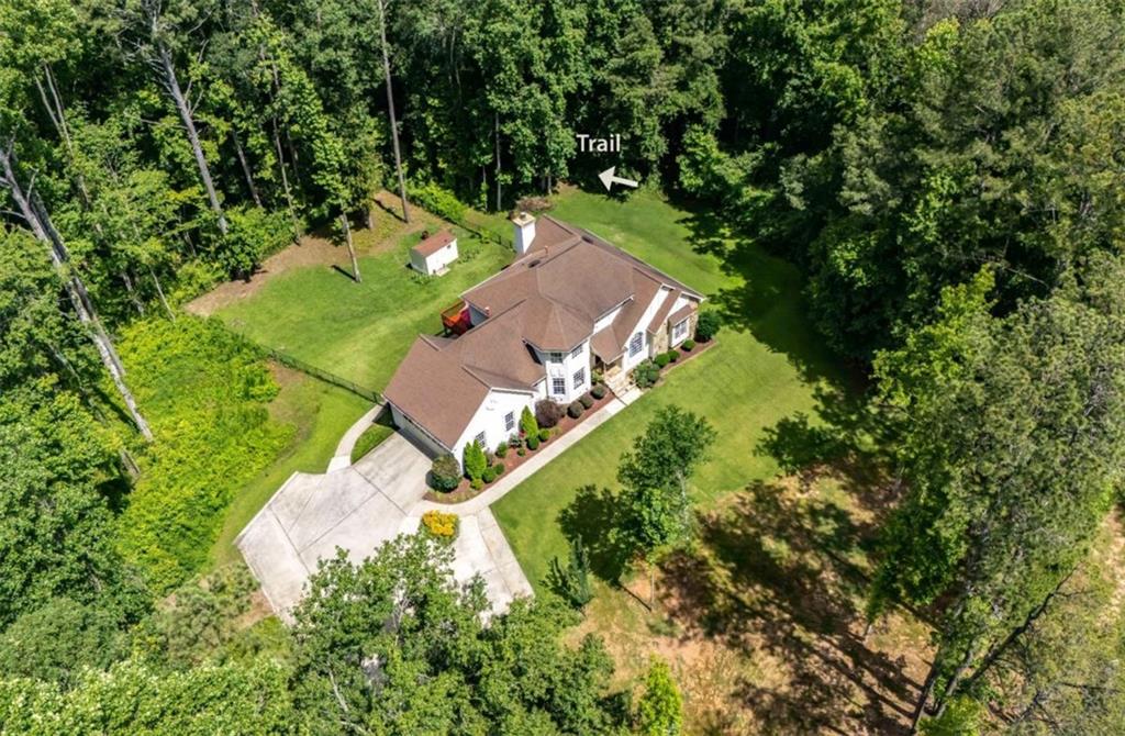 6945 John Rivers Road Fairburn, GA 30213 - Photo 9 of 65 an aerial view of a house