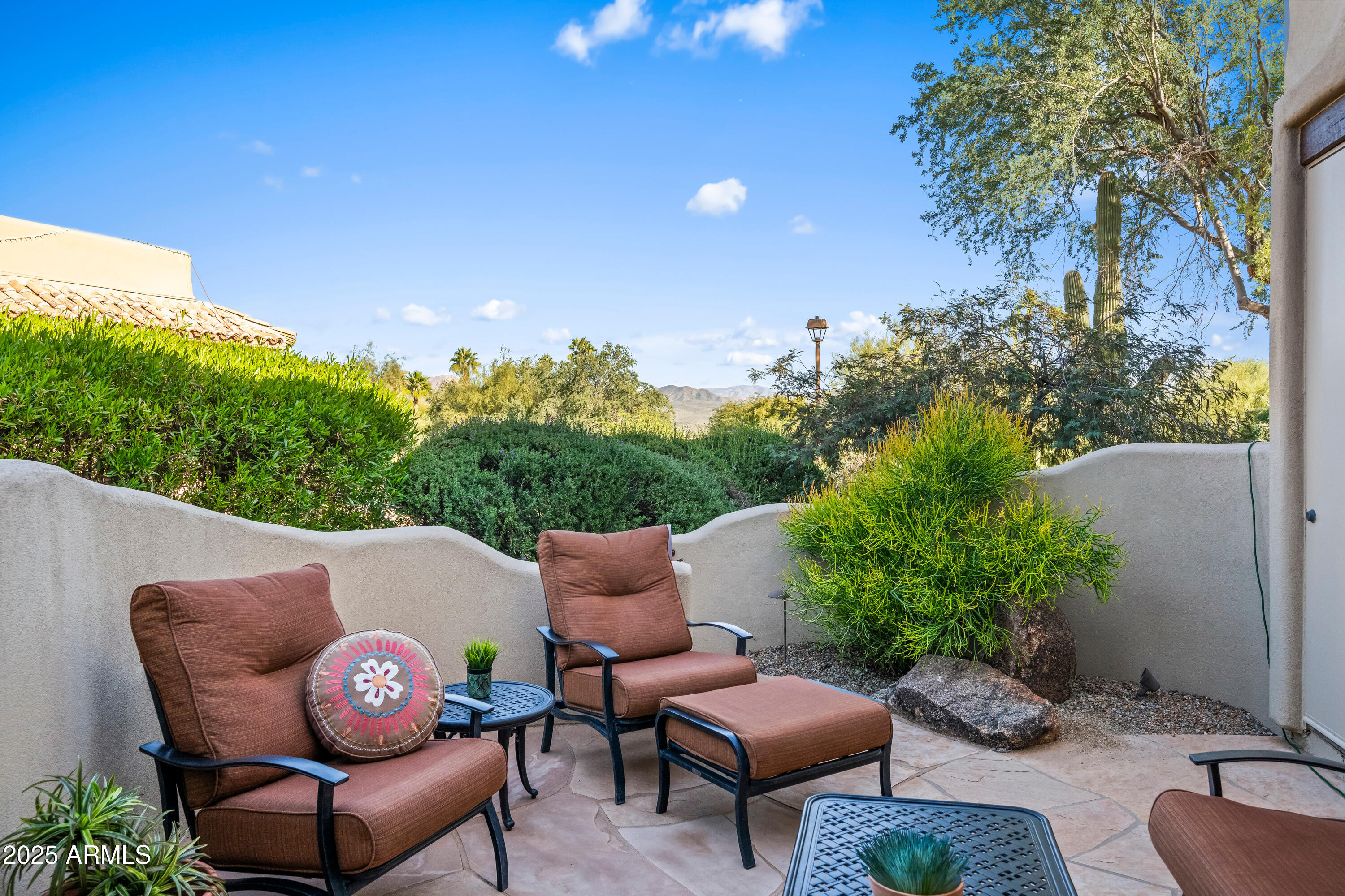 26708 North Aguila Road Rio Verde, AZ 85263 - Photo 18 of 46 a outdoor living space with furniture and city view