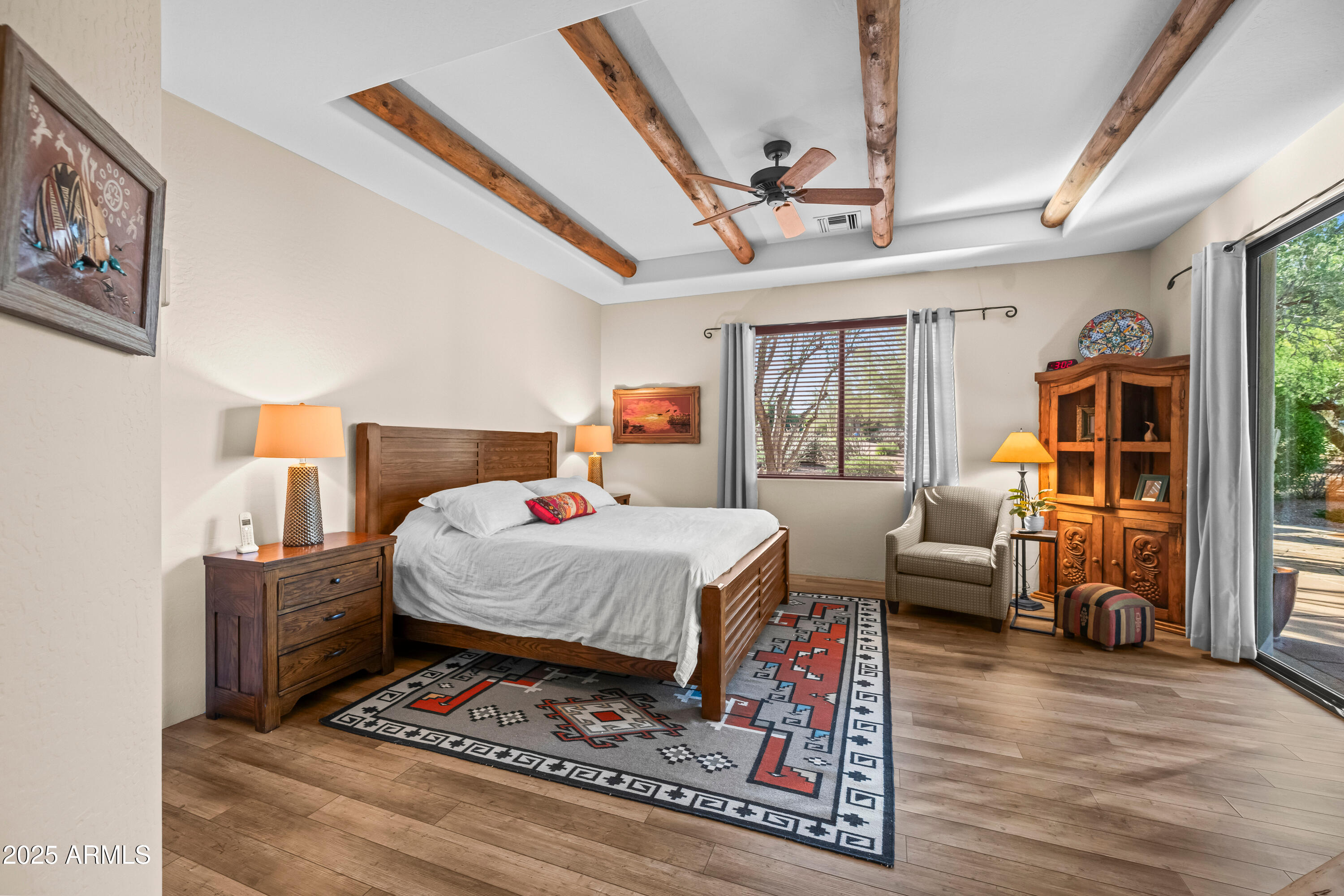 26708 North Aguila Road Rio Verde, AZ 85263 - Photo 22 of 46 a bed sitting in a bedroom next to a window